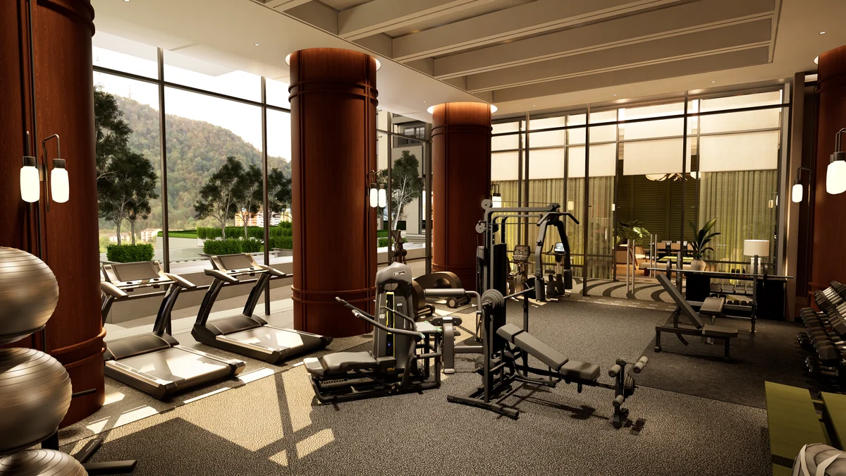 Rendering of the gymnasium with exercise equipment and a view of the landscape