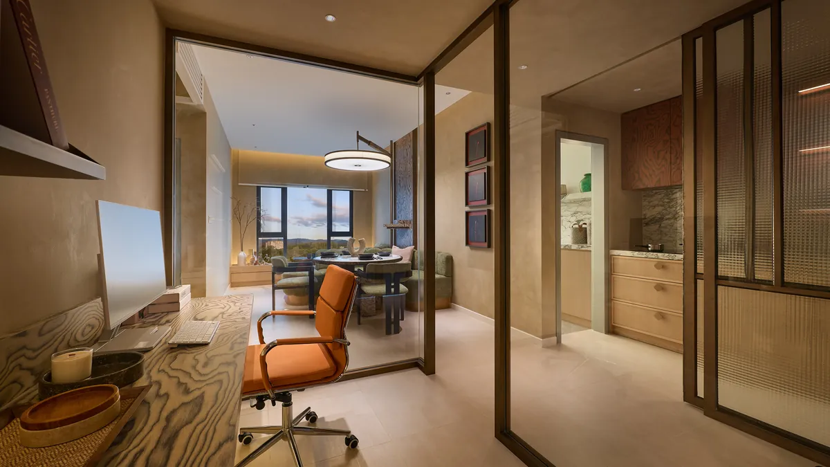 Type A entrance, the desk and glazed partition leading into the living room