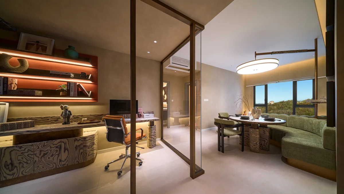 Type A living area with the work desk and dining beyond